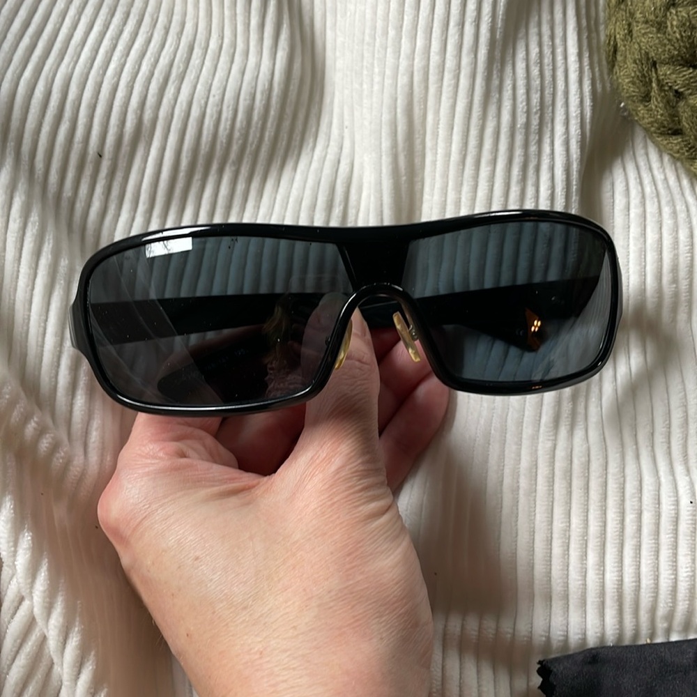 Vintage Prada sunglasses
With case and cloth